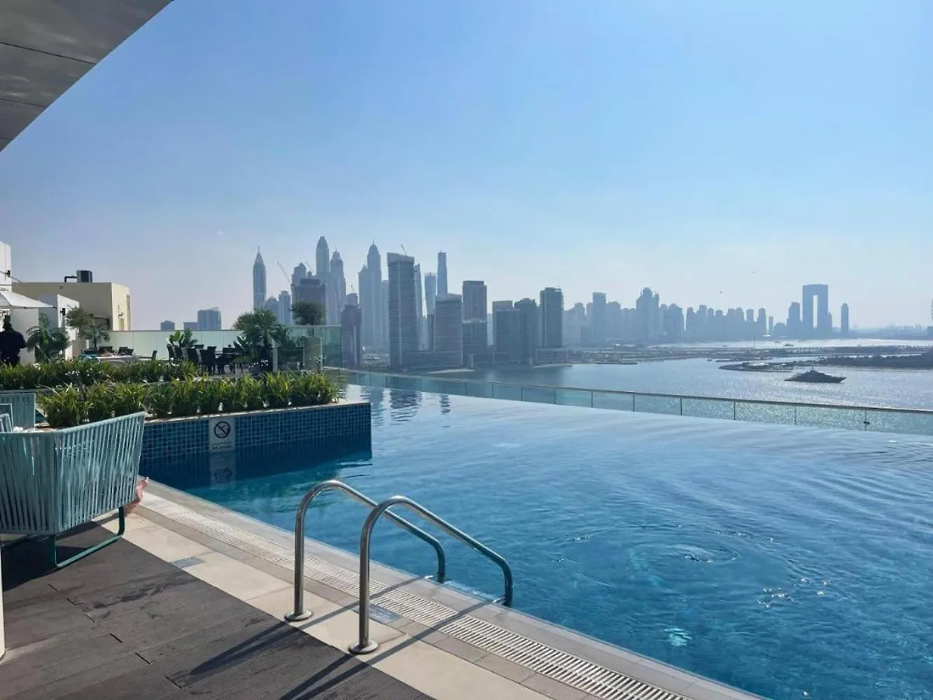 The Palm Hideaway Chic Apartment With Rooftop Vibes Managed By Sunnyhomes Dubai